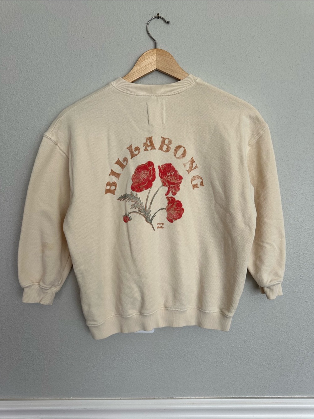 Girl’s Billabong Cream Crewneck with Small Floral Chest Print